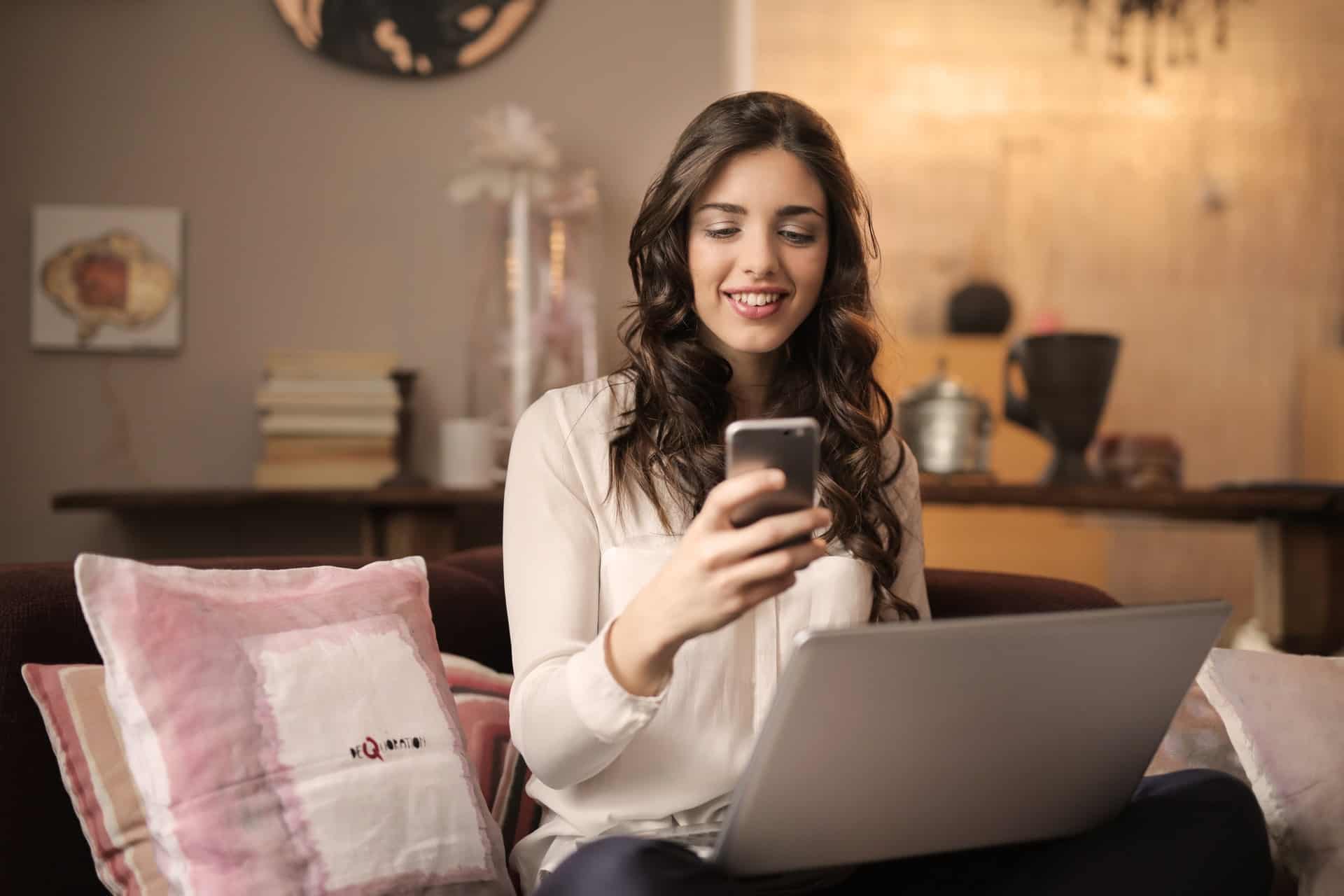 Girl with Phone and Laptop