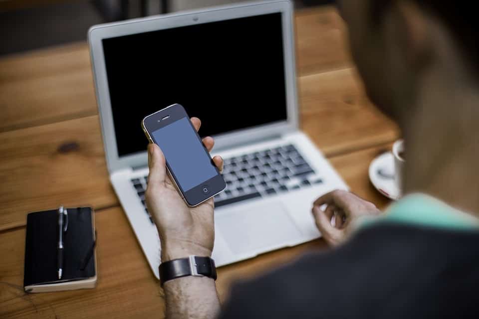 man holding cellphone